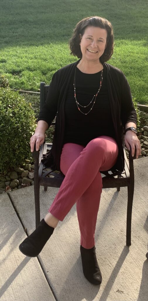 debbie sitting in a chair